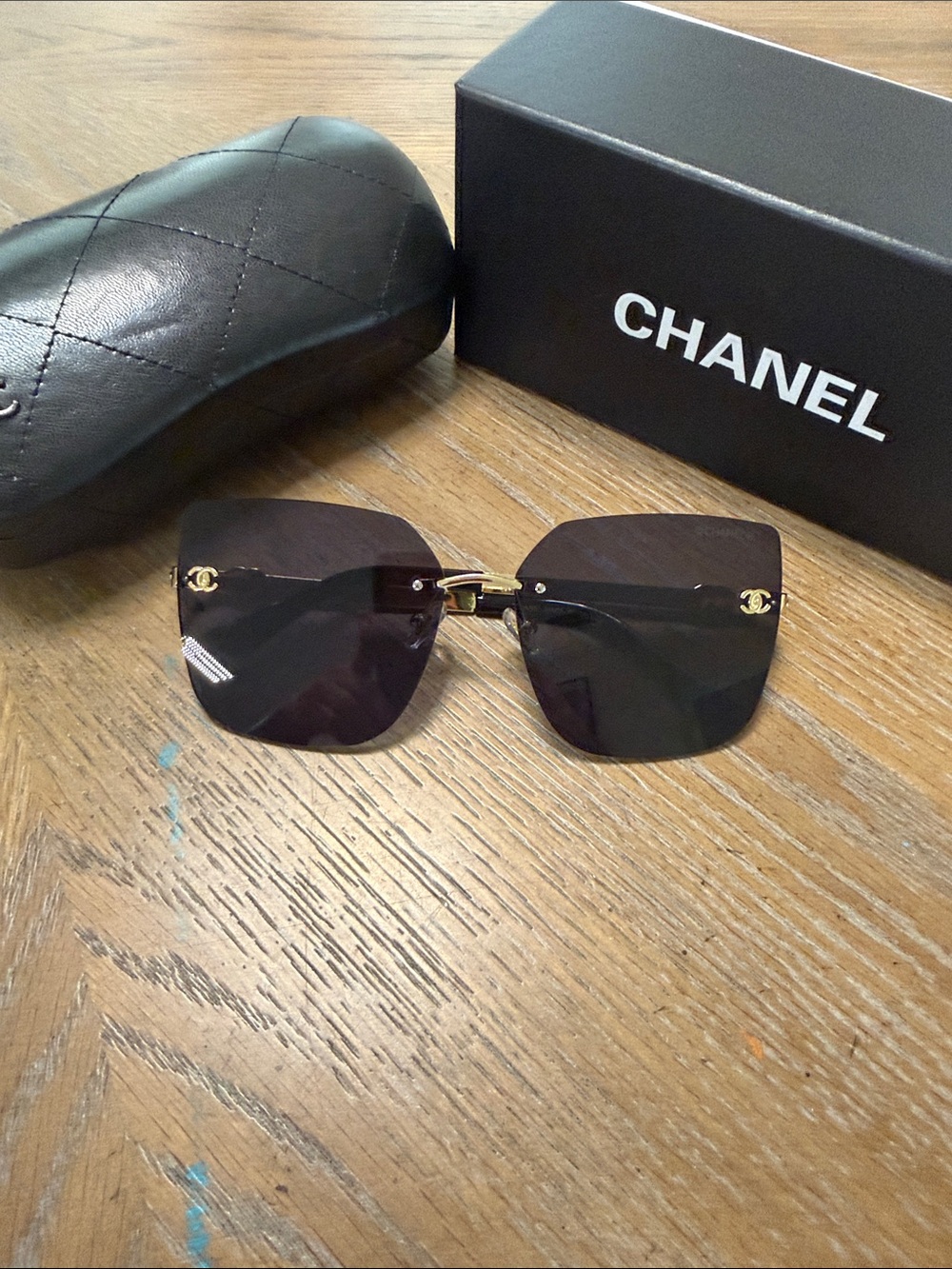 CHANEL Rimless Square Sunglasses in Black and Gold Accents - Picture 5 of 10
